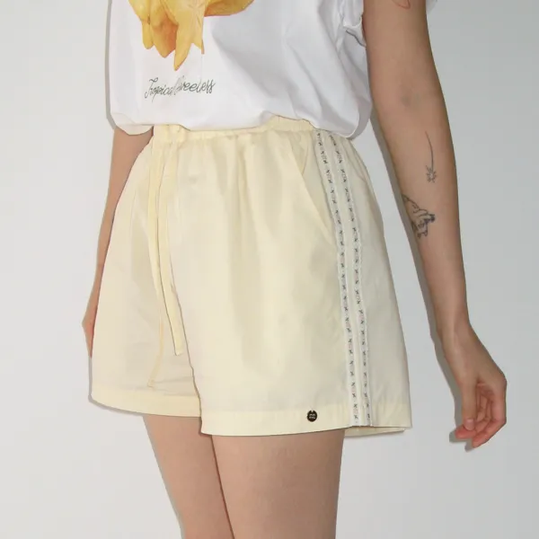 SIDE FLORAL TRACK SHORT PANTS SOFT YELLOW