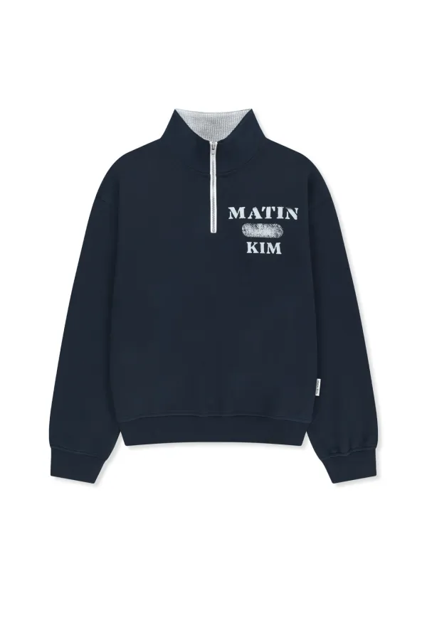 MATIN LOGO QUARTER ZIP UP IN NAVY