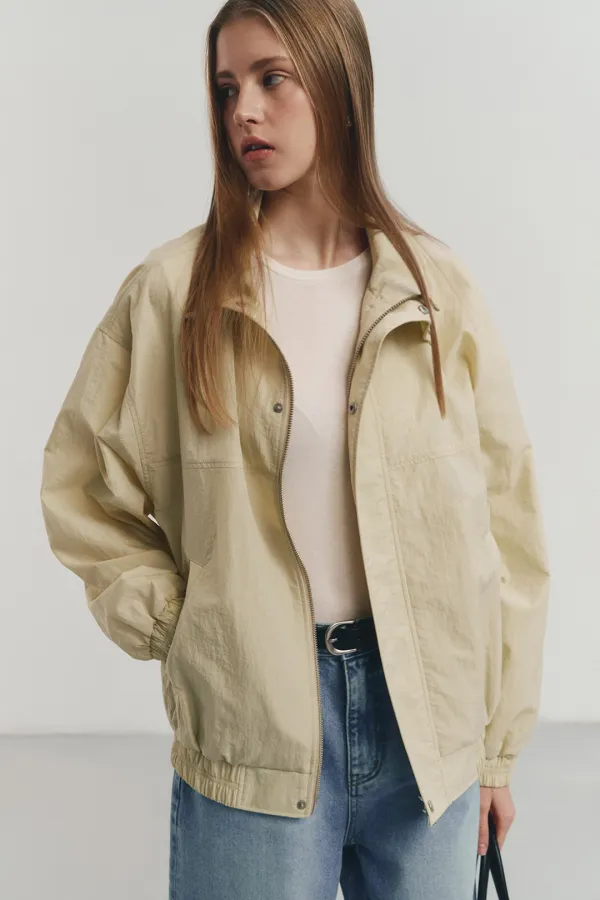 UNISEX WIND BREAKER BUTTER_UDJU4A112Y1