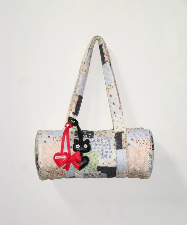 PATCHWORK QUILTED BARREL BAG