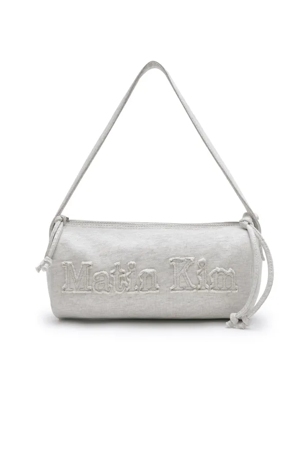 APPLIQUE LOGO JERSEY DUFFLE BAG IN LIGHT BEIGE