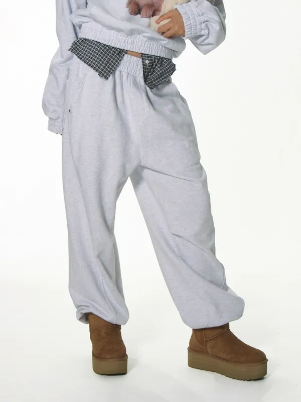 CURVED RIVET JOGGER PANTS_LIGHT MELANGE GREY
