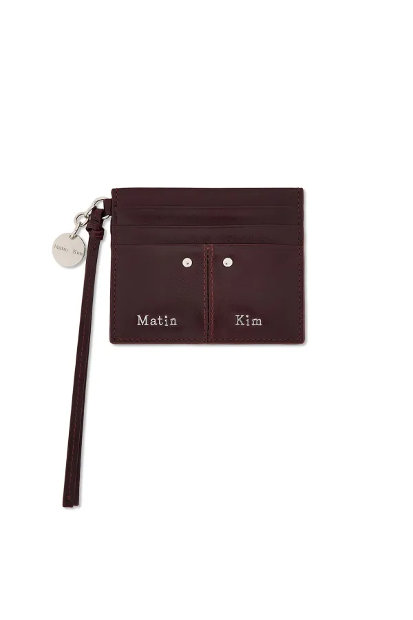 STEEL LOGO RIVET CARD WALLET IN WINE