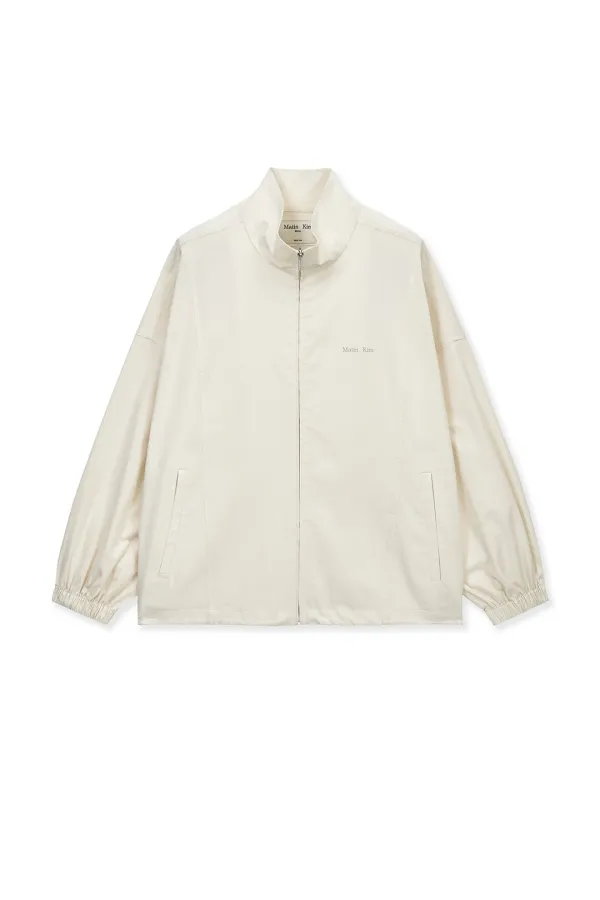 BACK LOGO HIGH NECK JUMPER IN CREAM