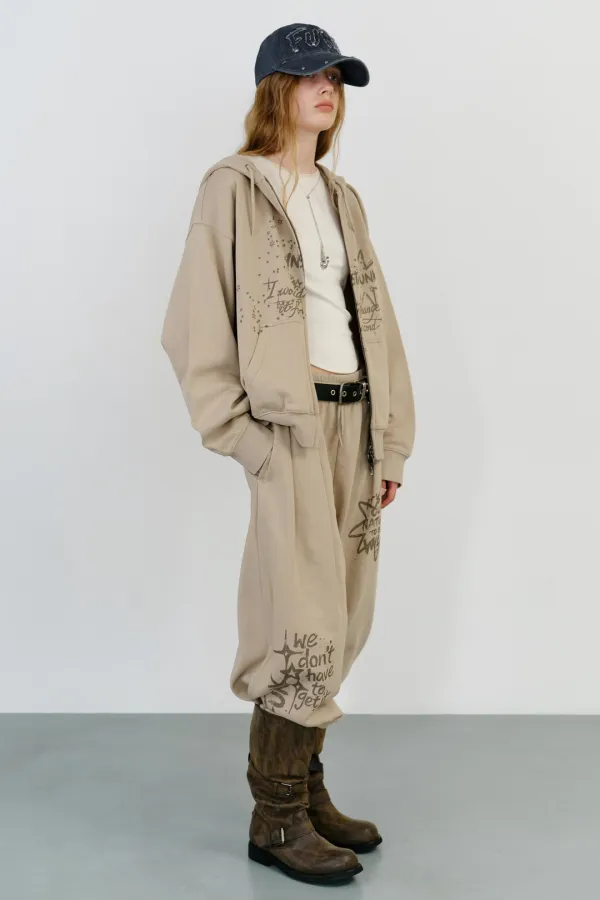 WASHED GRAPHIC SWEAT PANTS - BEIGE