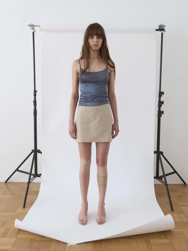 AURORA SILK MINI SKIRT IN CHAMPAGNE