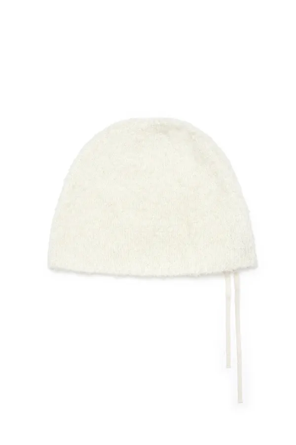 RIBBON TIE KNIT BEANIE IN IVORY