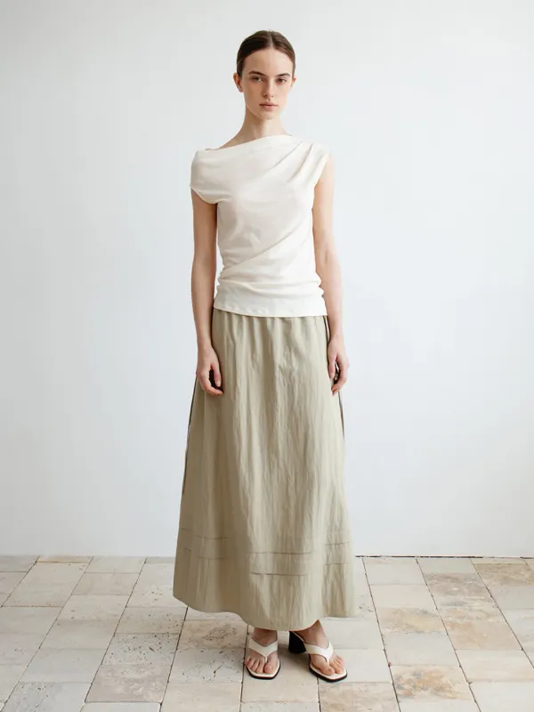 [예약배송 : 5/21] TIR TIERED TUCK FLARE SKIRT_KHAKI