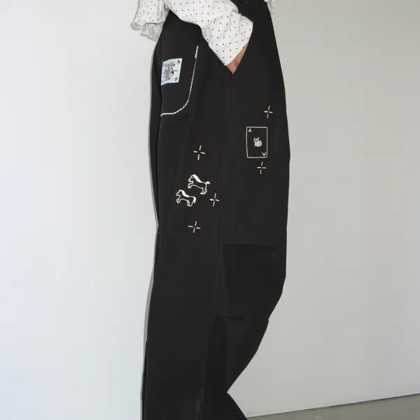 DRAWING STITCH PARACHUTE PANTS BLACK