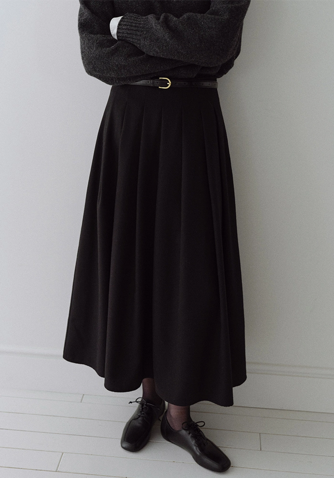 오브베이지 WOOL FLANNEL PLEATS SKIRT_BLACK_OE4C2XSK07BKA 상품 이미지 1