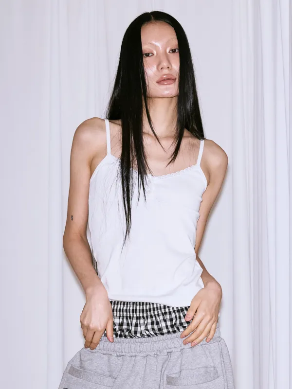 V NECK BUTTON SLEEVELESS - WHITE
