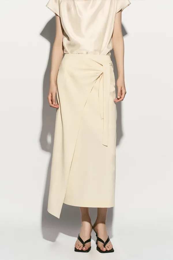 ASYMMETRIC HEM SIDE TIE SKIRT