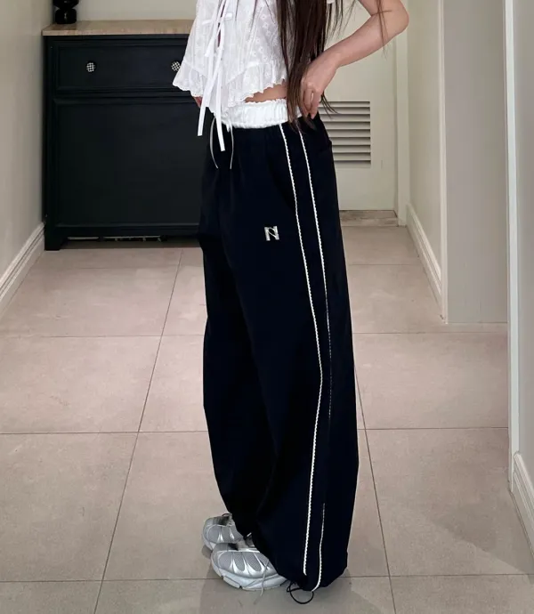 Newalrin emblem nylon wide Pants