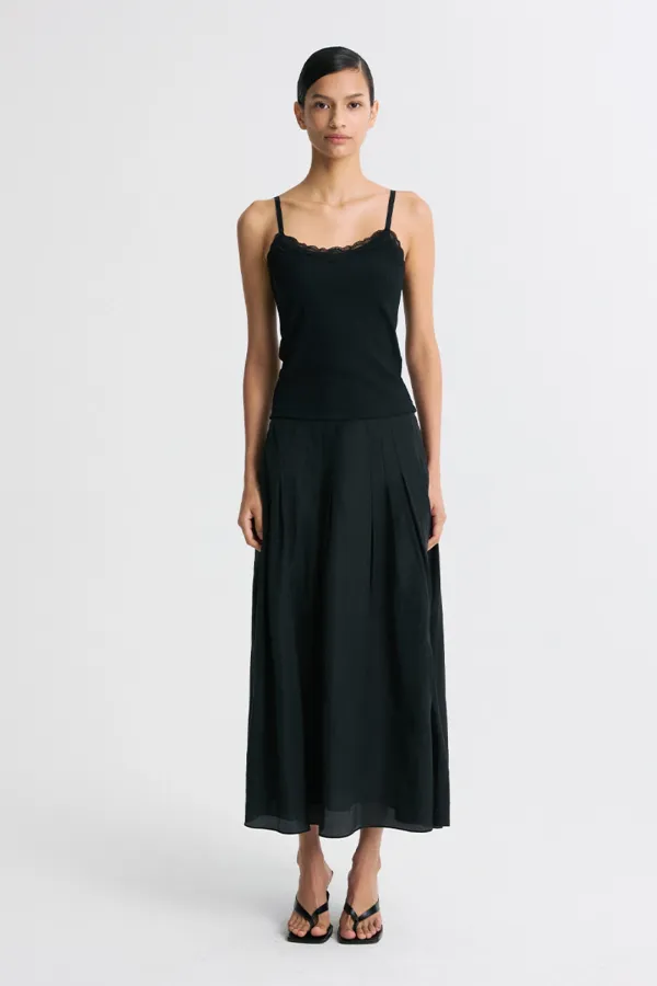FRONT-TUCK SILKY PLEATED SKIRT