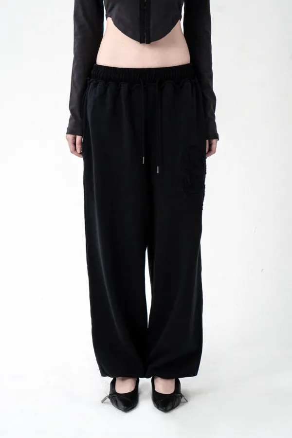 PATCH CUT-OFF SWEATPANTS BLACK