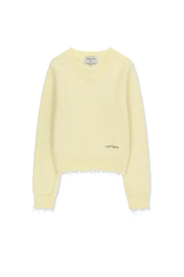 DISTRESSED HEM V NECK KNIT PULLOVER IN LIGHT YELLOW