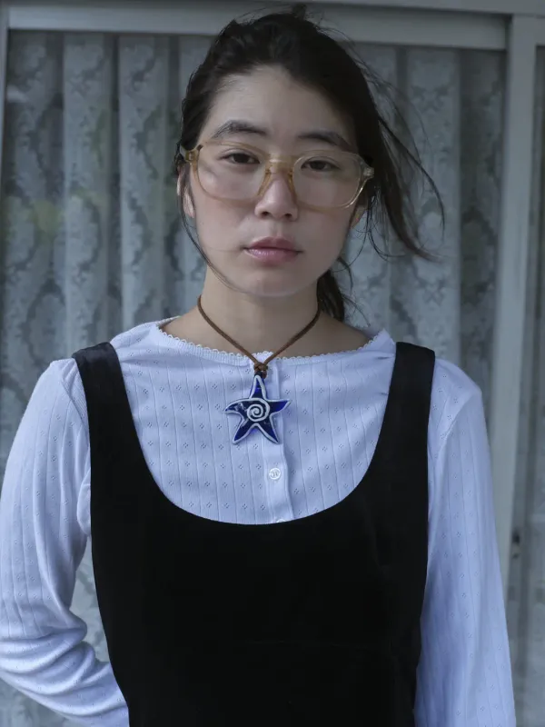 PUNCHED CARDIGAN IN WHITE / BLACK