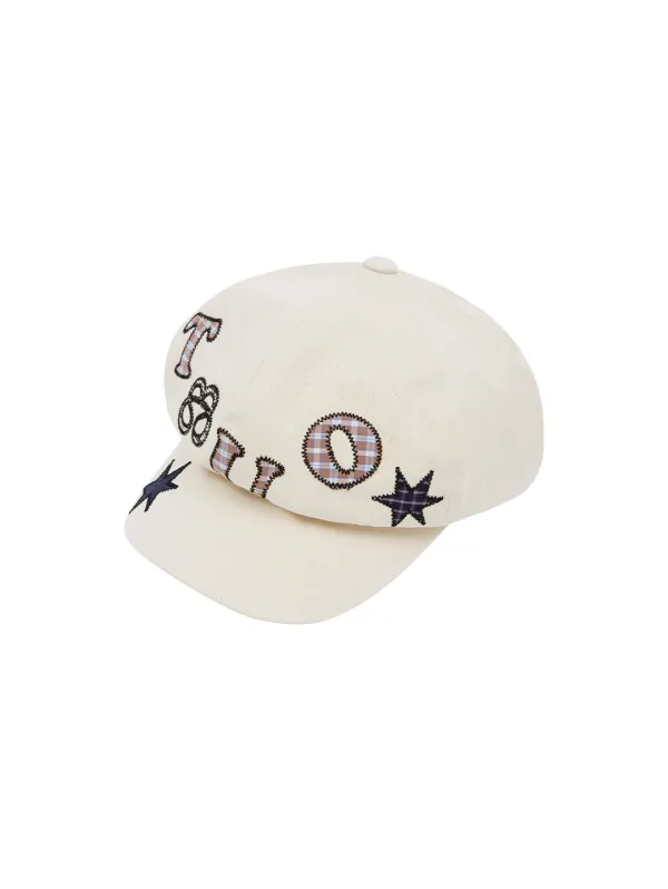 LOGO GRAPHIC NEWSBOY CAP [IVORY]