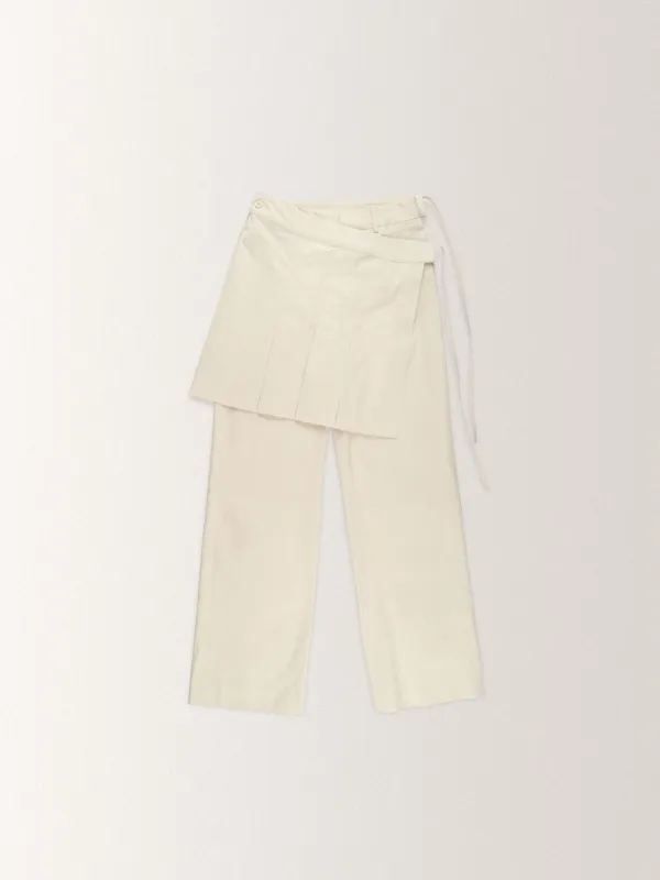 PLEATS SKIRT LAYERED PANTS  [ CREAM ]