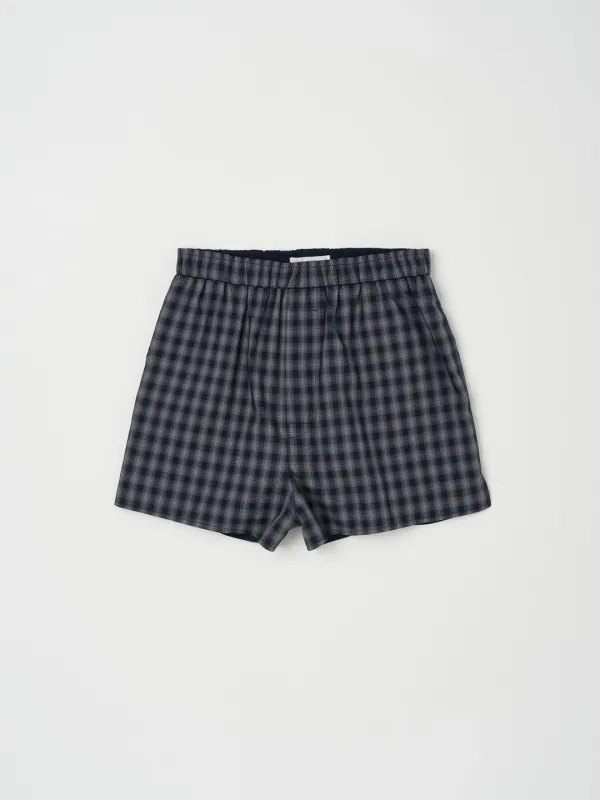 TRUNK REVERSIBLE CHECK SHORTS IN NAVY