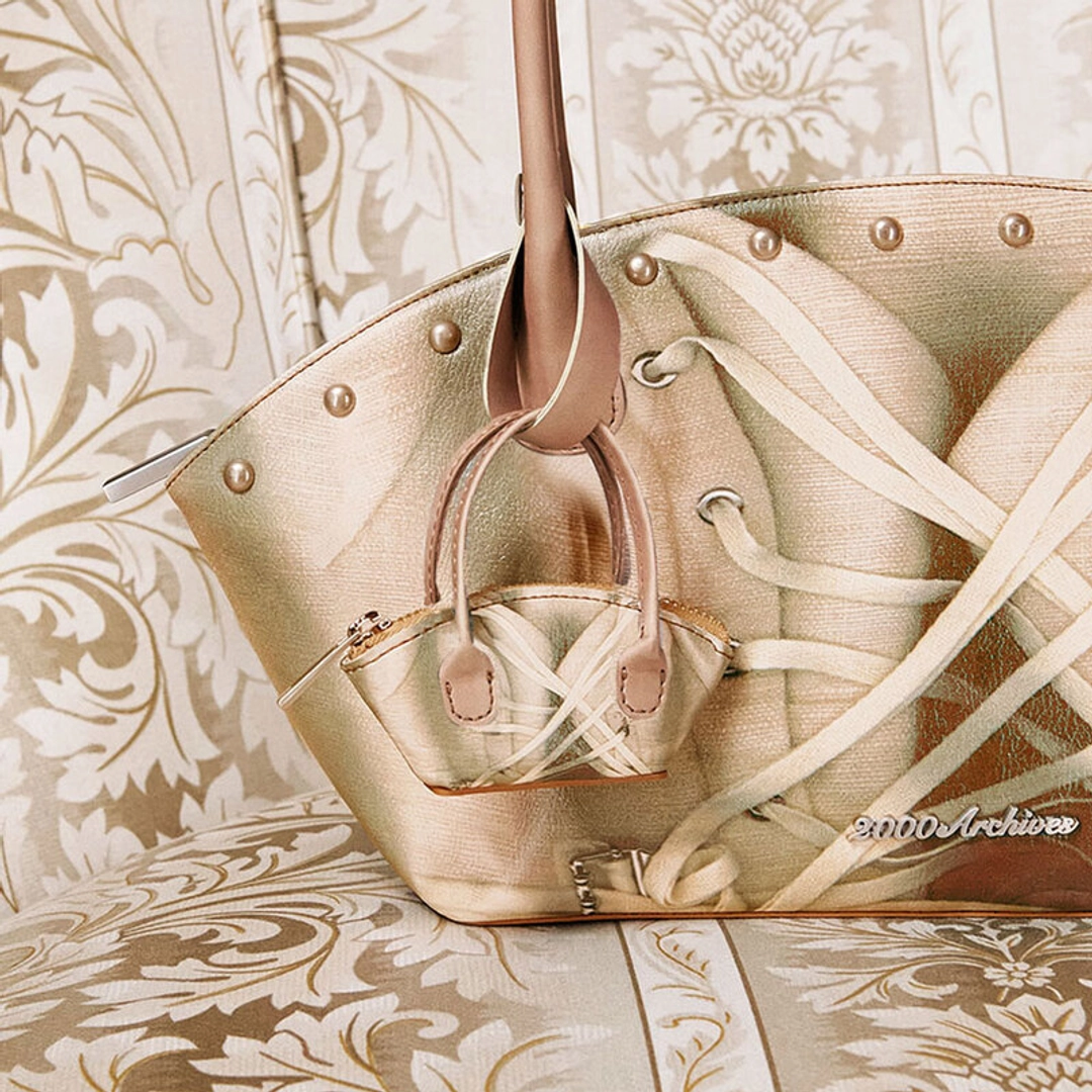 2000아카이브 CORSET HALF-MOON BAG KEYRING (BROWN) 상품 이미지 1