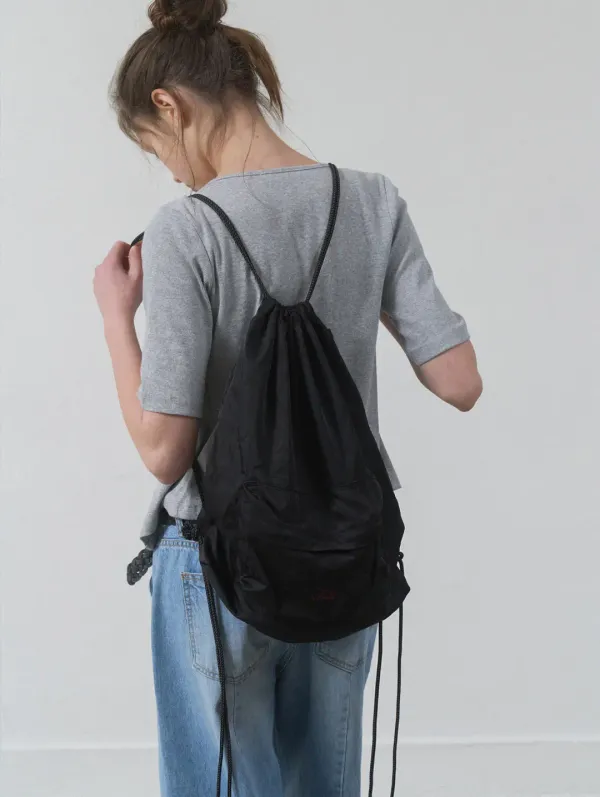 A TRAVEL BACKPACK - BLACK
