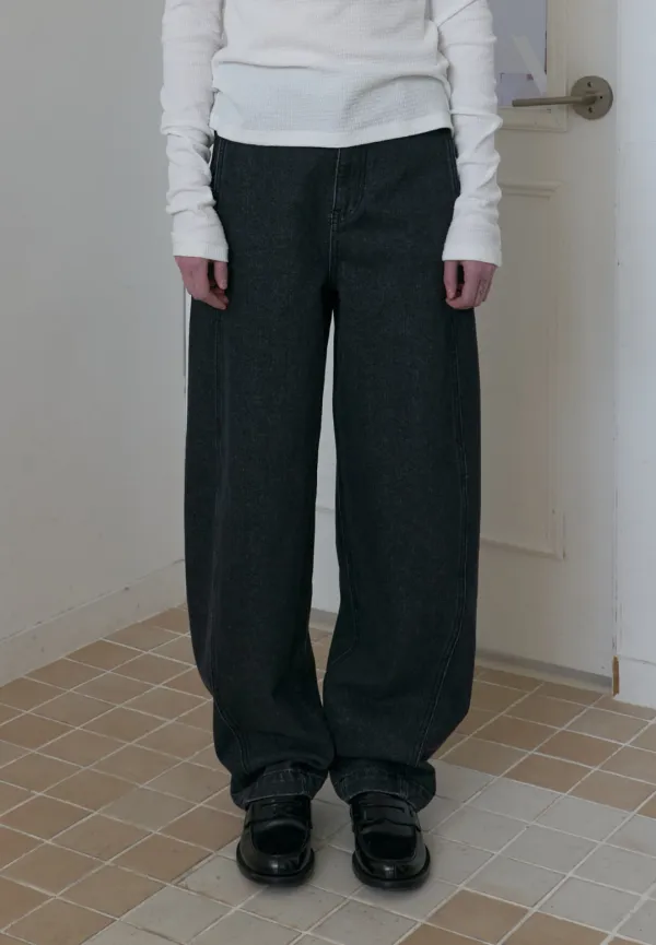 Curved denim pants (washed black)