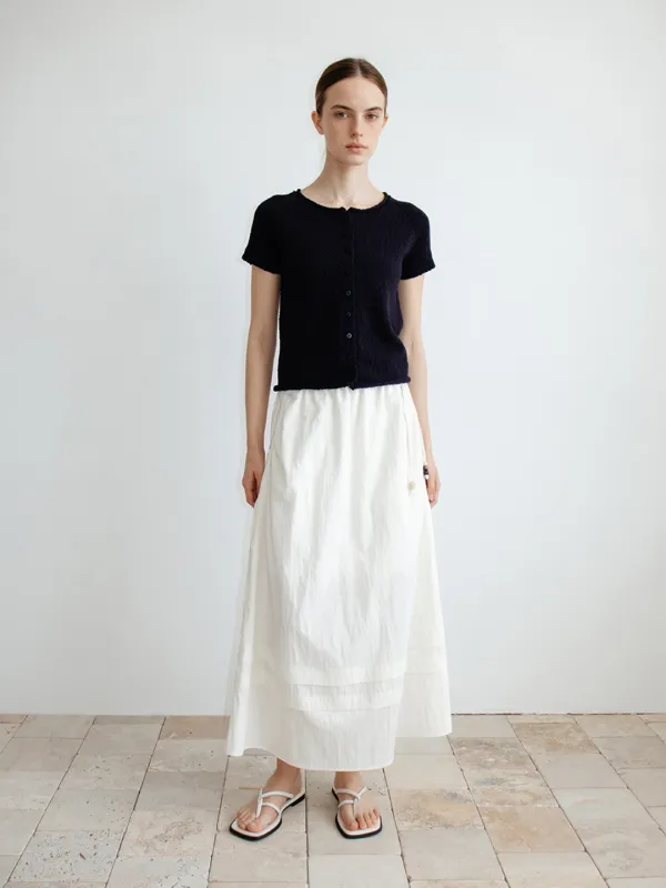 [예약배송 : 5/21] TIR TIERED TUCK FLARE SKIRT_IVORY
