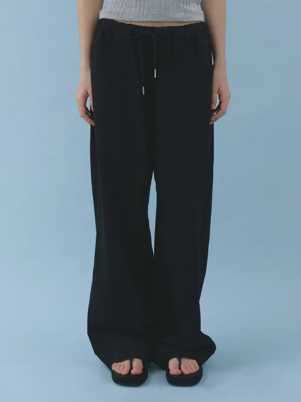 worn cotton pants (black)